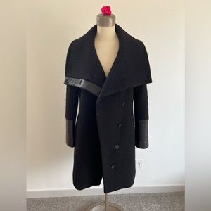 Club Monaco 100% wool coat. Black with leather collar and cuffs. Size large.